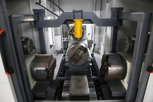 Máy tiện CNC 3 đầu khỏa mặt thân valve
